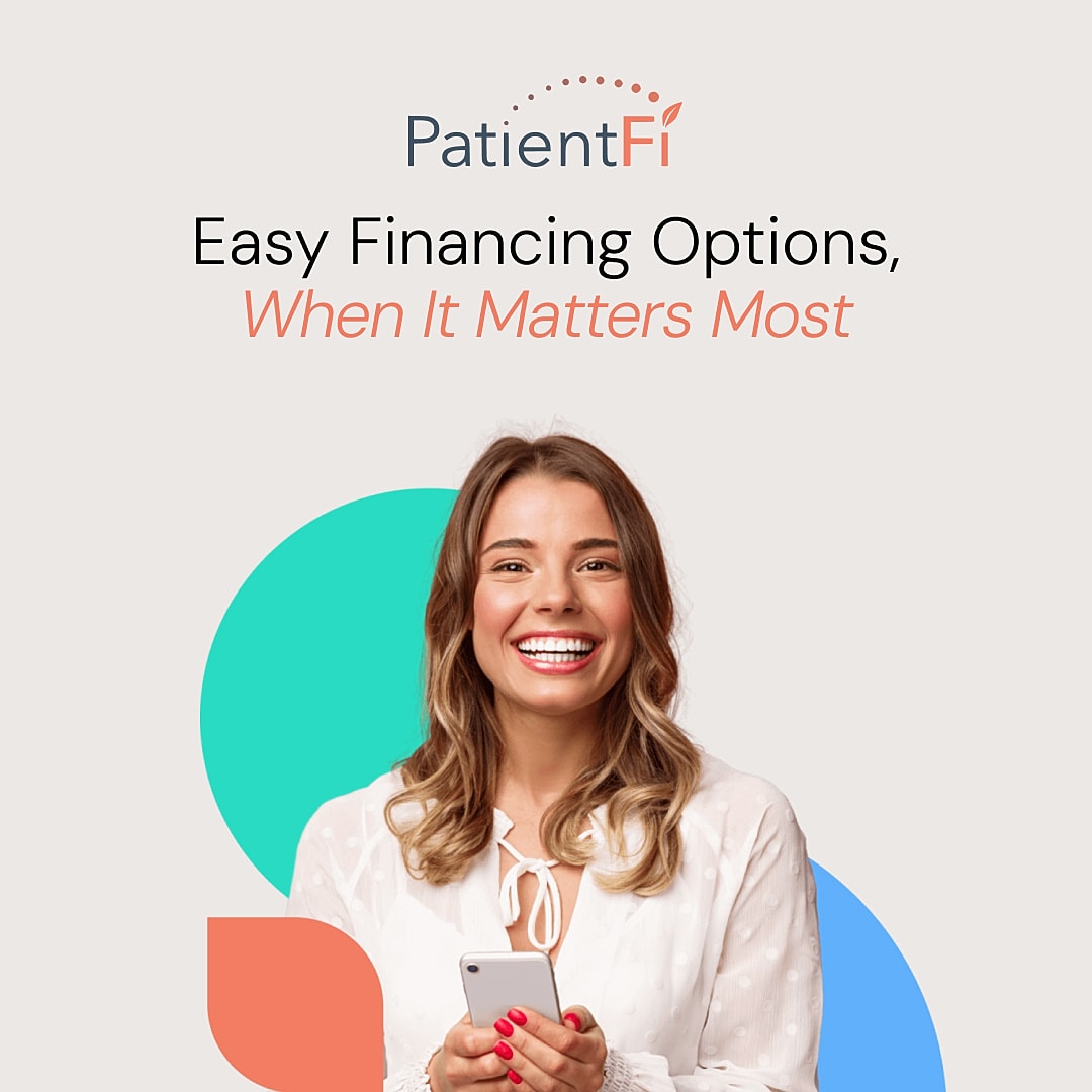 Happy woman with smartphone promoting financing options.