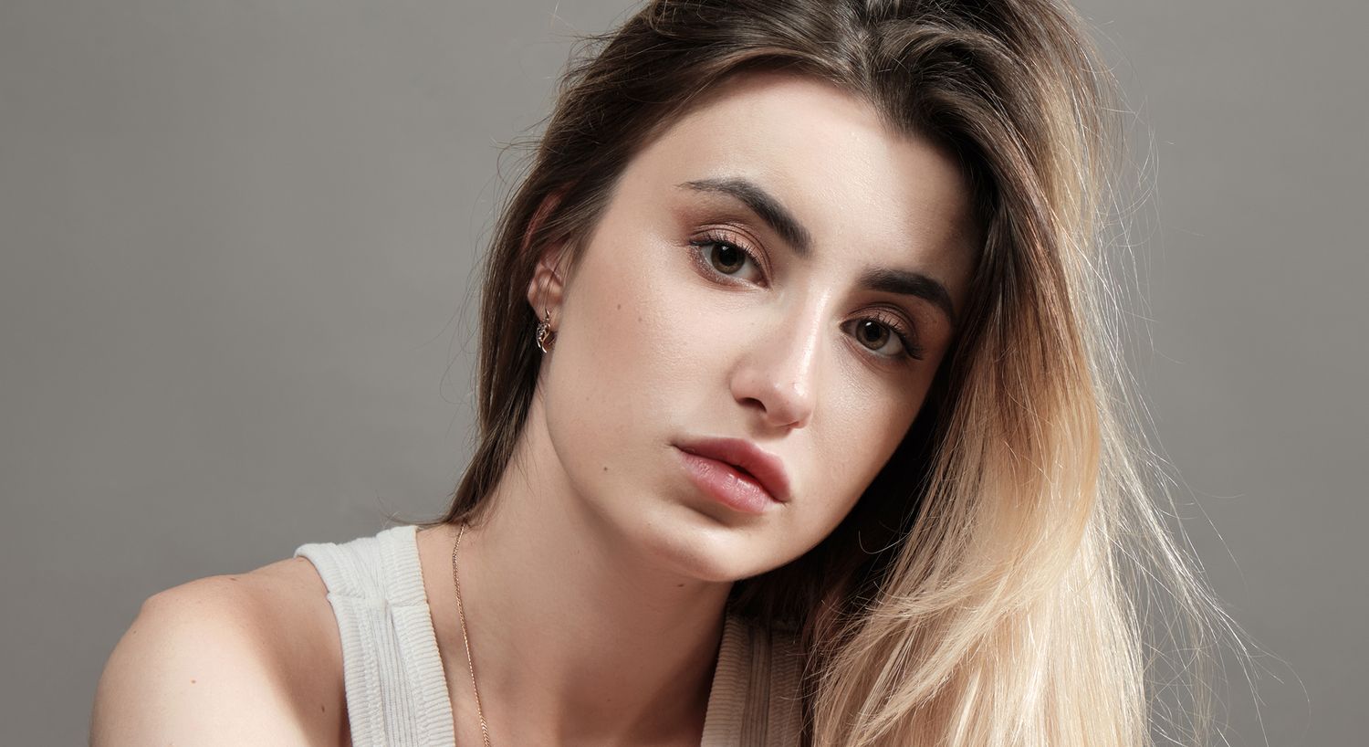 Portrait of a woman with long hair.